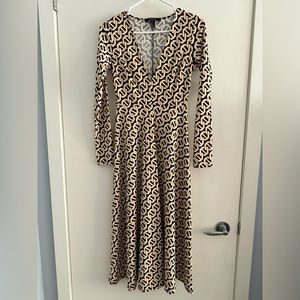FOREVER 21 - Step into this stylish midi dress links pattern dress! Like new!